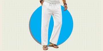 White linen pants with a drawstring waistband, paired with flip-flops against a blue circular background.
