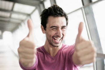 Man giving two thumbs up man giving two thumbs up