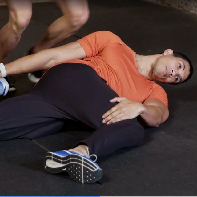 Demonstration of the Brettzel stretch exercise with physical trainers. Demonstration of the Brettzel stretch exercise with physical trainers.