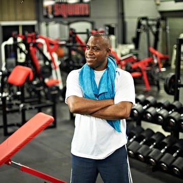 Black Male Standing in Local Gym After Workout black male standing in local gym after workout