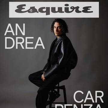 magazine cover featuring a seated individual in stylish attire with bold typography magazine cover featuring a seated individual in stylish attire with bold typography