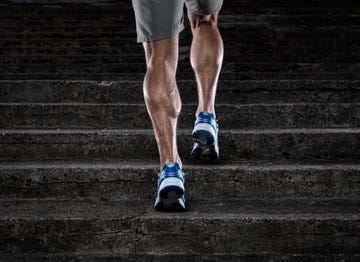 Practice close up of young man running up the stairs
