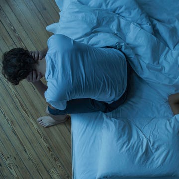 Man unable to sleep while wife sleeps comfortably unaware Man unable to sleep while wife sleeps comfortably unaware