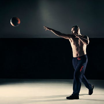 Young man cross training with a medicine ball young man cross training with a medicine ball
